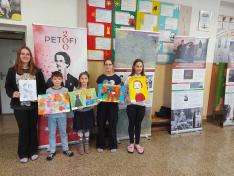 students with their paintings
